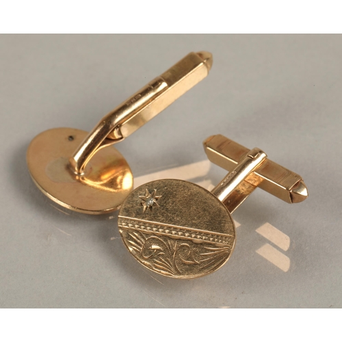 67 - 9ct gold pair cufflinks set with white gems, 5.7g