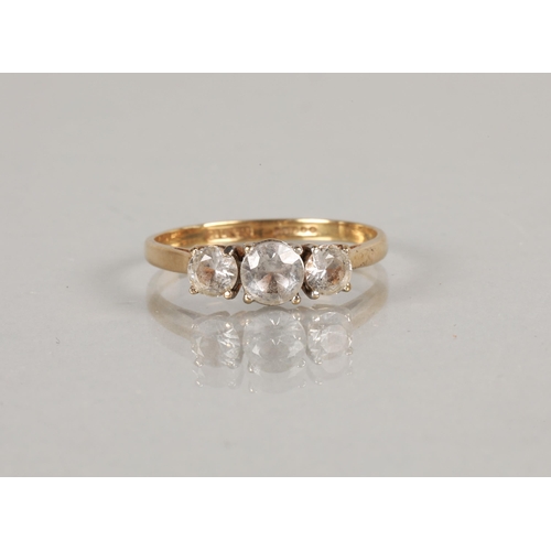 72 - 9ct gold ring set with a trio of white gems, ring size Q, gross weight 1.8g