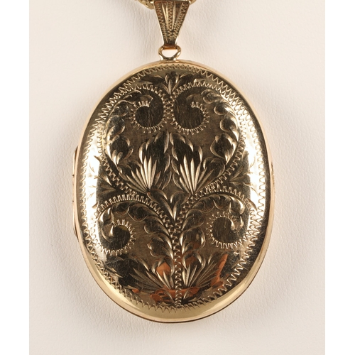 96 - 9ct gold locket on yellow metal chain, 4.5cm x 3.5cm, locket 12.3g without chain