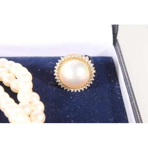 127 - Cultured pearl and diamond three row necklace and earrings suite, the pearls strung to an 18ct gold ... 