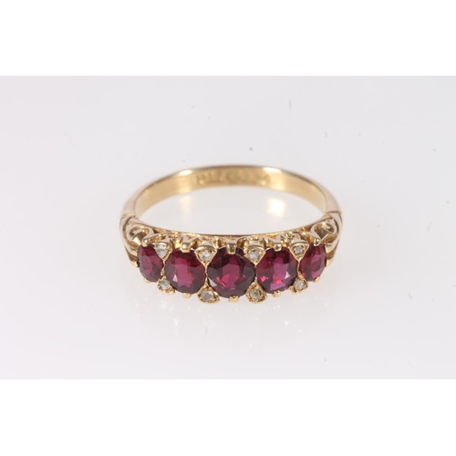 146 - 18ct gold ruby and diamond thirteen stone ring, makers mark 'AH&S' and stamped '18ct', ring size... 