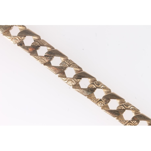 162 - 9ct gold flattened faceted curb link neck chain, the clasp hallmarked, 31.6g.