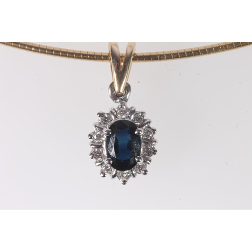 183 - Unmarked yellow and white metal pendant set with diamonds and sapphire on 9ct gold chain, 7.8g gross... 