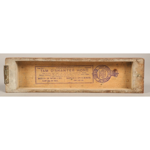 206 - Tam o' Shanter razor hone, stamped labels exterior and interior