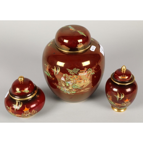 37 - Carltonware rouge royale ginger jar and cover with chinoiserie decoration and two similar jars and c... 