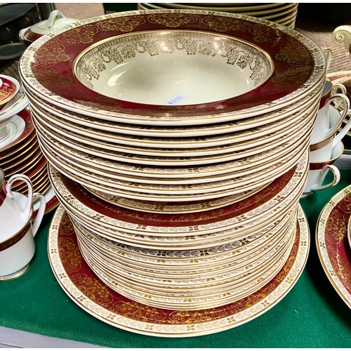 255 - Noritaki Goldmere teaset and a Crown Ducal gilt and burgundy decorated dinner service.