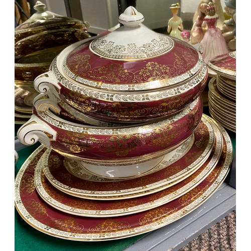 255 - Noritaki Goldmere teaset and a Crown Ducal gilt and burgundy decorated dinner service.