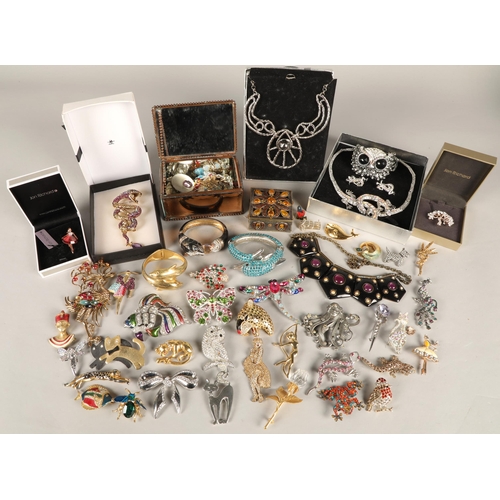 128 - Large quantity of costume jewellery, some boxed, including bangles, bejewelled brooches, Jon Richard... 