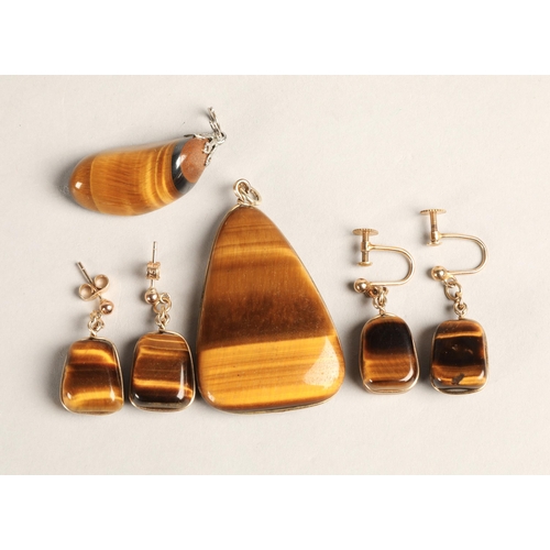 137 - Tigers Eye jewellery to include two pendants and two pairs of earrings (one pair screw-on), earrings... 