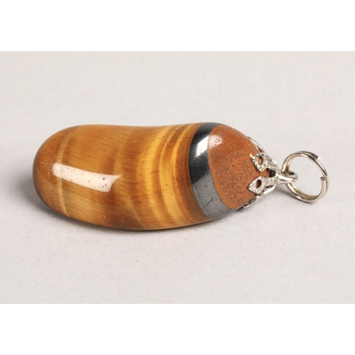 137 - Tigers Eye jewellery to include two pendants and two pairs of earrings (one pair screw-on), earrings... 