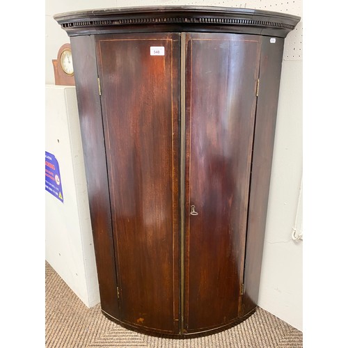 548 - Mahogany wall mounted corner cabinet, 113cm high