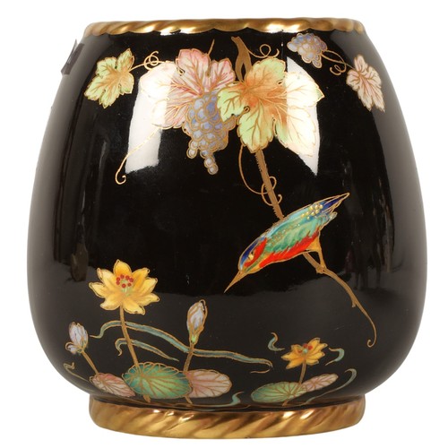 25 - Carltonware black ground baluster vase decorated with flowers. 14cm high.