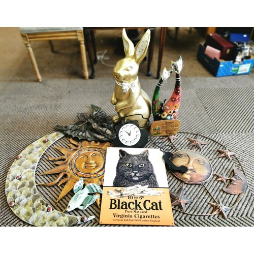 407 - Large model rabbit, two sunburst wall plaques, cat ornaments etc.