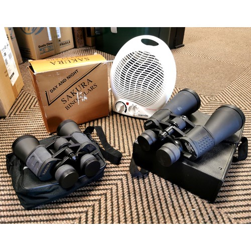 411 - Pair of Sakura field glasses, another pair and an electric heater