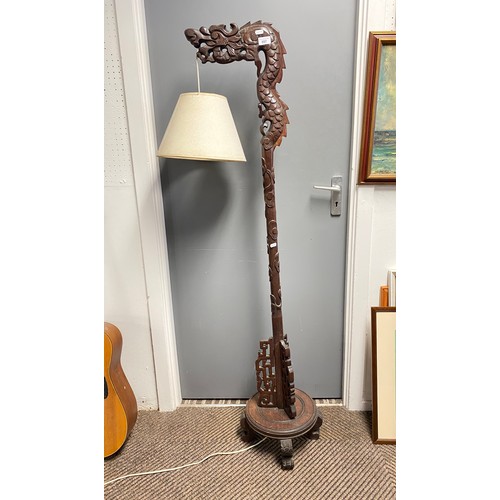 557 - Oriental-style carved hardwood freestanding reading lamp, 155cm high