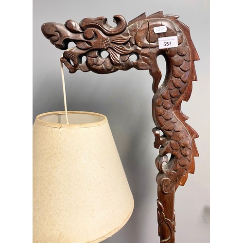 557 - Oriental-style carved hardwood freestanding reading lamp, 155cm high