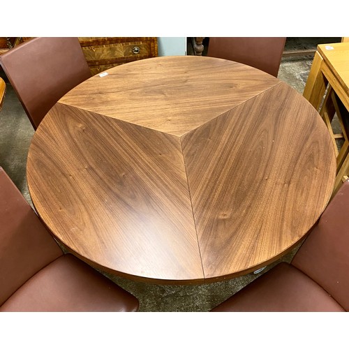 582 - Skovby circular extending dining table with four matching leather chairs