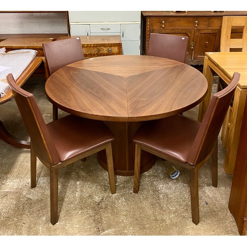 582 - Skovby circular extending dining table with four matching leather chairs