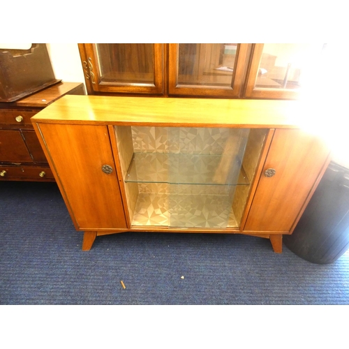 449 - 1960's glazed display cabinet with cupboards either side.