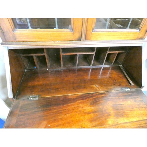 450 - Edwardian mahogany bureau bookcase, astragal doors to upper section.