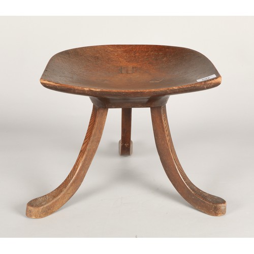 692 - Arts & Crafts 'Thebes' stool by Leonard Wyburd for Liberty & Co. London. No label to the und... 