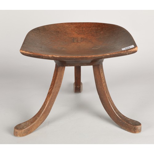 692 - Arts & Crafts 'Thebes' stool by Leonard Wyburd for Liberty & Co. London. No label to the und... 