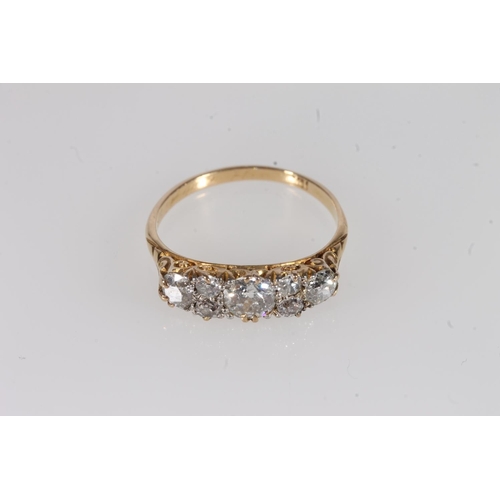 130 - Edwardian 18ct gold and seven diamond ring, the seven round cut graduating stones approximately 0.9 ... 