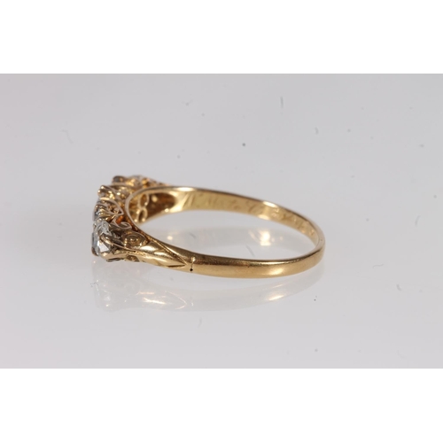 130 - Edwardian 18ct gold and seven diamond ring, the seven round cut graduating stones approximately 0.9 ... 