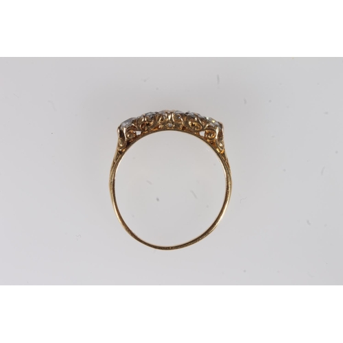 130 - Edwardian 18ct gold and seven diamond ring, the seven round cut graduating stones approximately 0.9 ... 