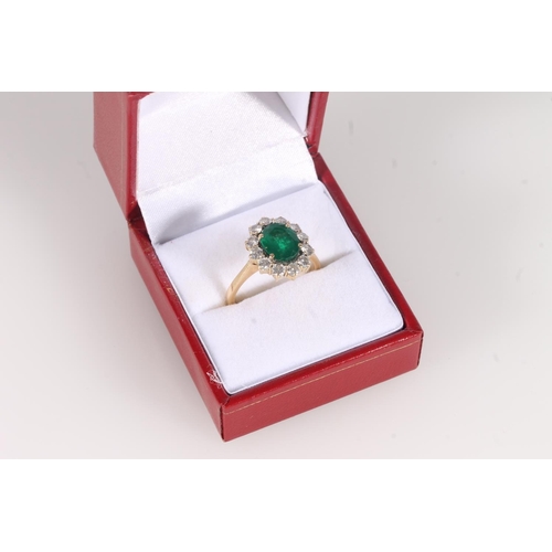 134 - 18ct gold, emerald and diamond cluster ring, the oval cut emerald within a halo of round cut diamond... 