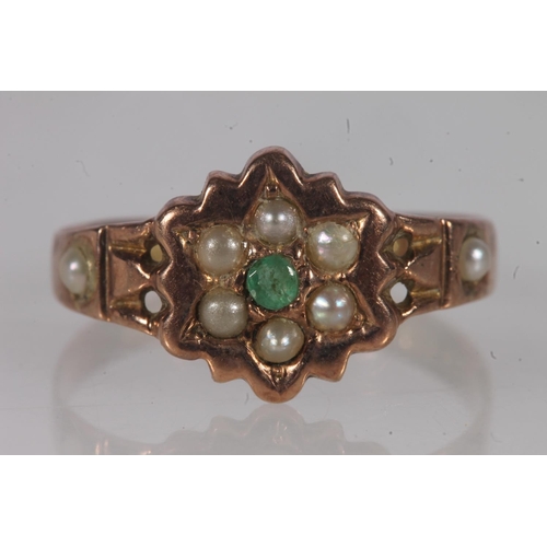 135 - Victorian 9ct gold, seed pearl and emerald ring, the round cut emerald surrounded by six split pearl... 