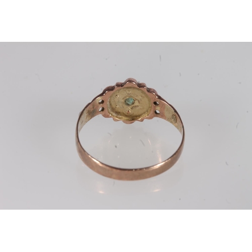 135 - Victorian 9ct gold, seed pearl and emerald ring, the round cut emerald surrounded by six split pearl... 