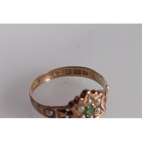 135 - Victorian 9ct gold, seed pearl and emerald ring, the round cut emerald surrounded by six split pearl... 