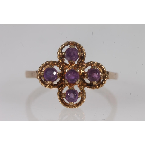 136 - Edwardian 9ct gold and amethyst ring, the five round cut amethysts prong set on a rope twist openwor... 