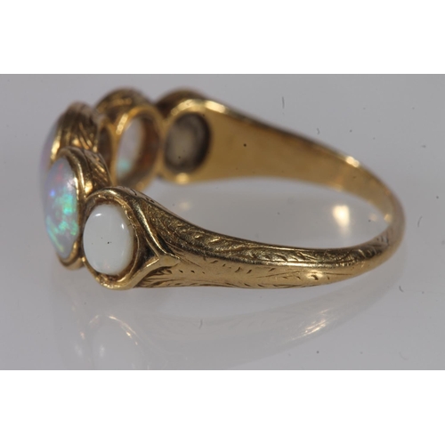 139 - Early 20th century yellow metal and opal five stone ring, the graduated cabochon opals bezel set wit... 