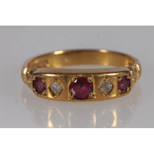 190 - 18ct gold ruby and diamond ring, the round cut rubies and diamonds bezel prong set in a raised block... 