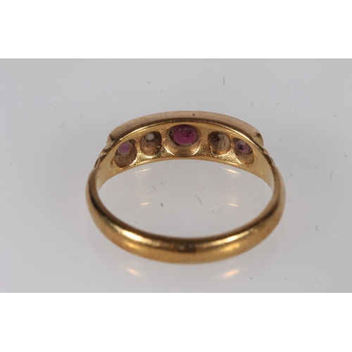 190 - 18ct gold ruby and diamond ring, the round cut rubies and diamonds bezel prong set in a raised block... 