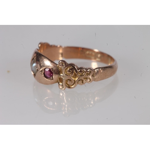 192 - Edwardian 9ct gold seed pearl and ruby ring, the split pearl flanked by two round cut rubies in a pr... 