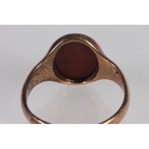 193 - 9ct gold gent's Masonic intaglio seal signet ring, the hardstone seal engraved with square and compa... 