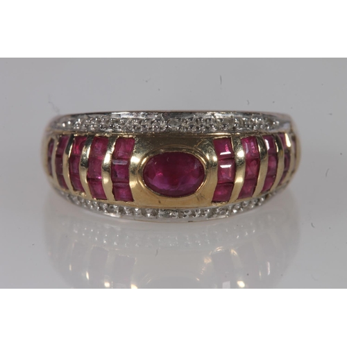 200 - 9ct gold ruby and diamond ring, the bezel set central oval ruby flanked by interspersed ruby bands a... 