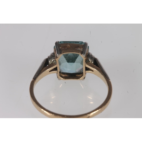 205 - 9ct gold and blue green spinel/tourmaline ring, the radiant cut stone set on white gold shoulders le... 