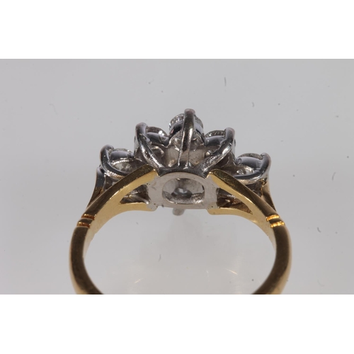 208 - 18ct gold and diamond cluster ring, the nine round brilliant cut diamonds claw set on a platinum mou... 