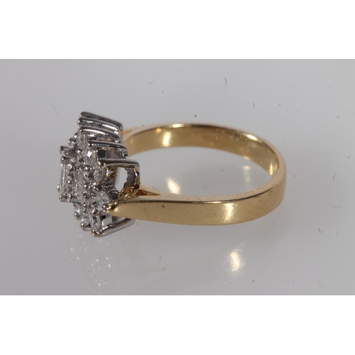 209 - 18ct gold and diamond cluster ring, the central baguette cut diamonds flanked by twelve individual r... 