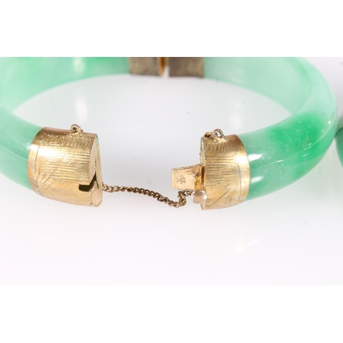 220 - Three Chinese jade bangles, maximum internal width 5.8cm, together with a Chinese jade and marcasite... 