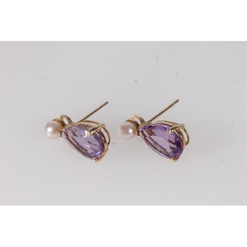 223 - 18ct gold and amethyst earrings, the pear cut amethysts below a single small pearl, each amethyst ap... 