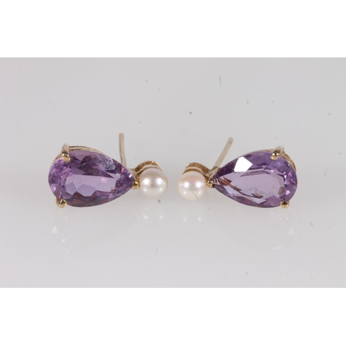 223 - 18ct gold and amethyst earrings, the pear cut amethysts below a single small pearl, each amethyst ap... 