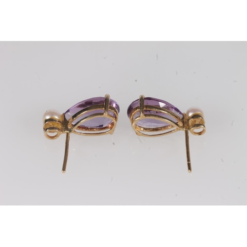 223 - 18ct gold and amethyst earrings, the pear cut amethysts below a single small pearl, each amethyst ap... 