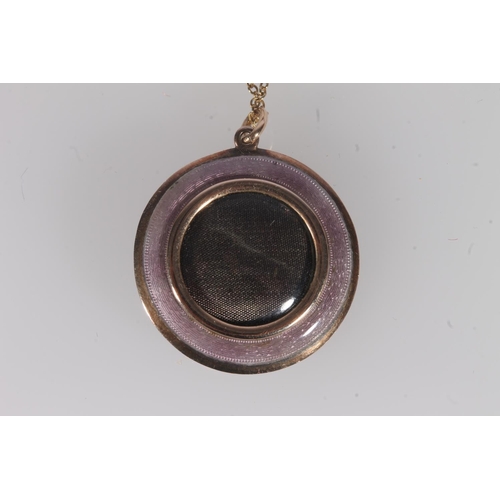 226 - Edwardian 15ct gold and pink guilloché enamel locket pendant, centred with a split pearl within enam... 