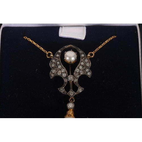 230 - Edwardian pearl and diamond pendant, the openwork white and yellow metal frame with small diamonds a... 