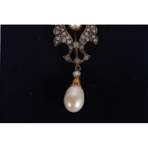 230 - Edwardian pearl and diamond pendant, the openwork white and yellow metal frame with small diamonds a... 